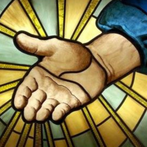 Painted stained glass window depicting the hand of God