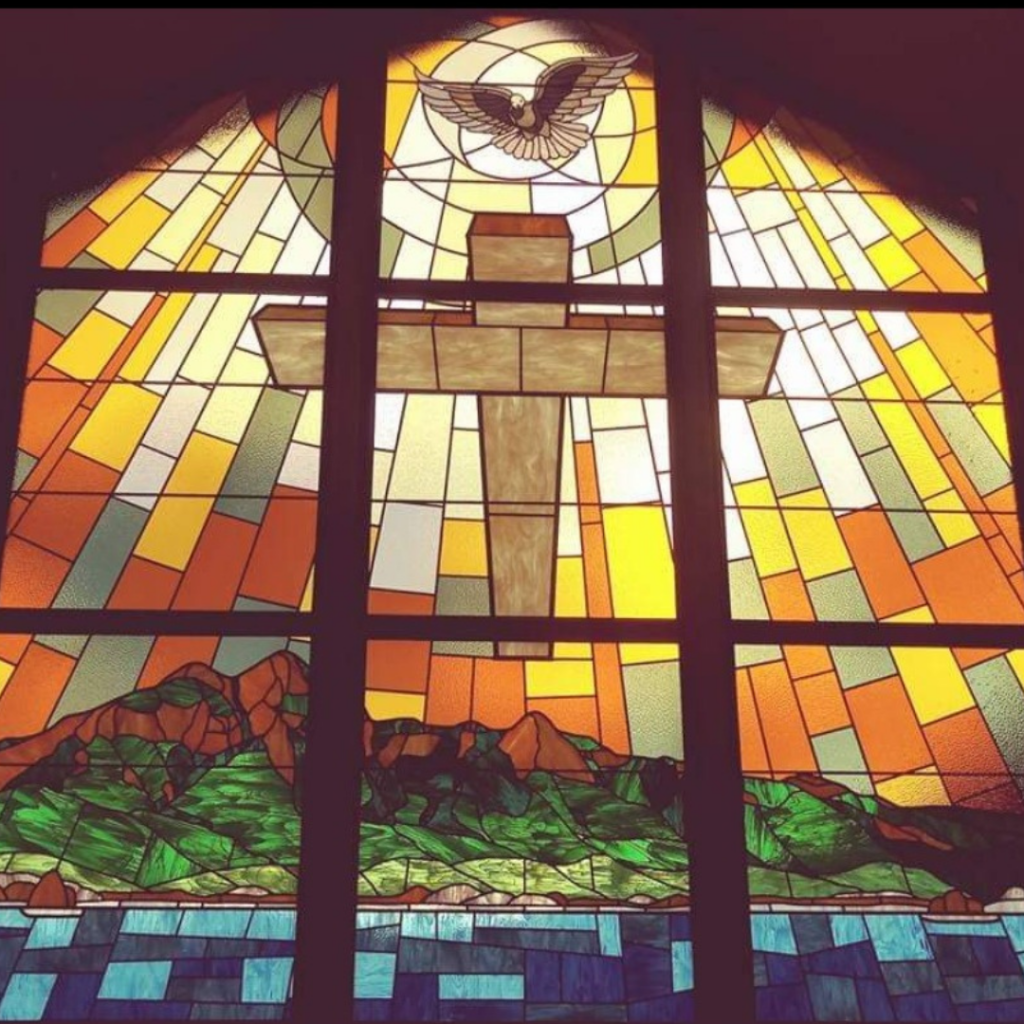 stained glass window of the cross