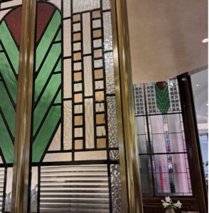 New stained glass panel with Jan Bitenco's original design in the background
